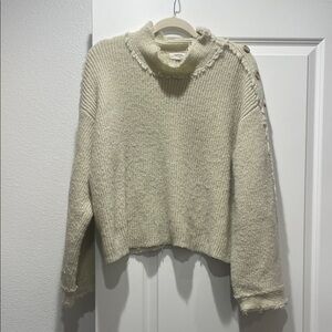 Elegant Cream Turtleneck Sweater with Button Accents Bell Sleeves